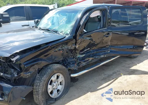 2015 Toyota Tacoma Base V6 z USA, uszkodzony, nr VIN 5TFLU4EN6FX144939